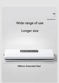 White automatic vacuum sealer machine for household food preservation on a kitchen counter.