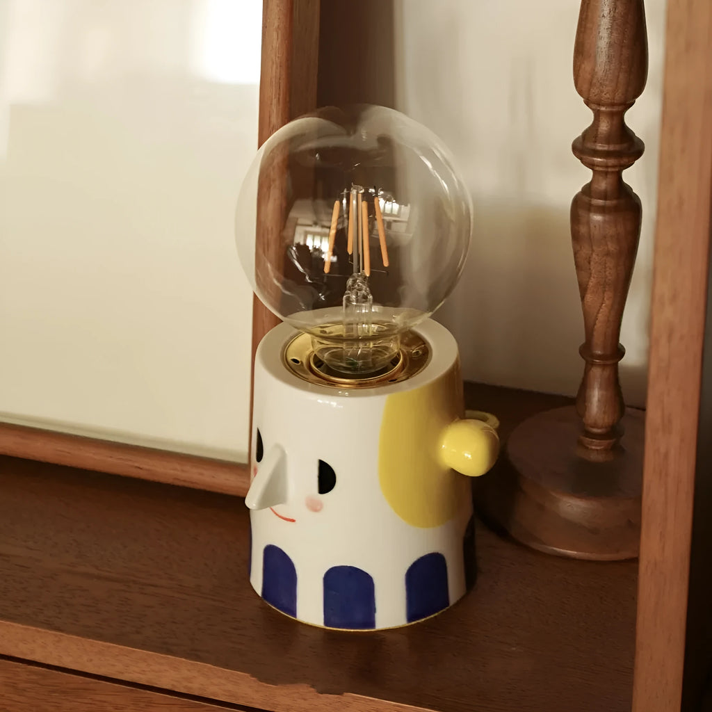 Handmade ceramic spherical ball headlight lamp on bedside table