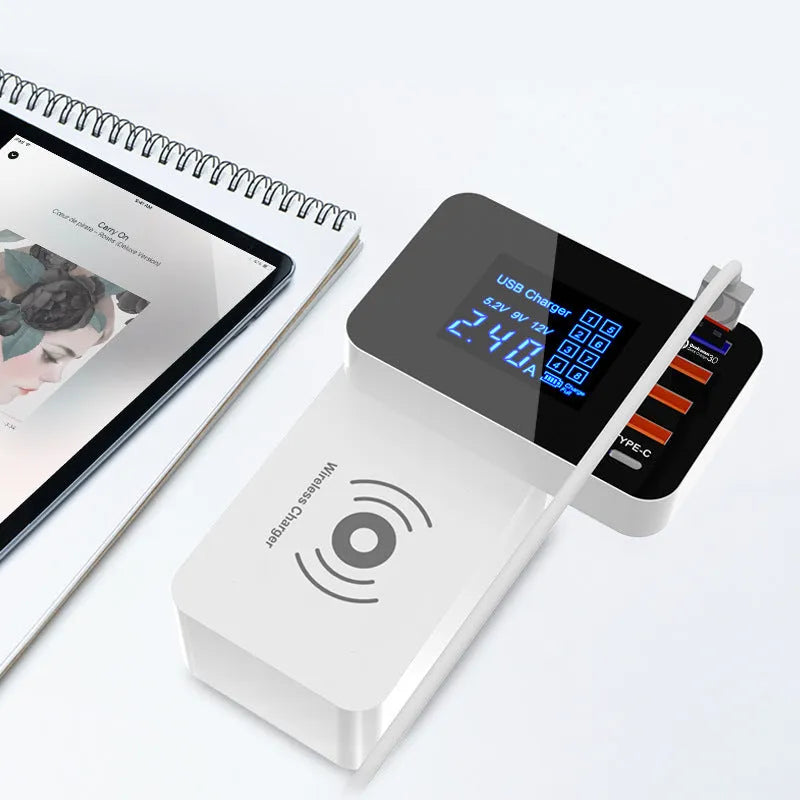 White 10W wireless charger with multi-USB ports and indicator light on a desk