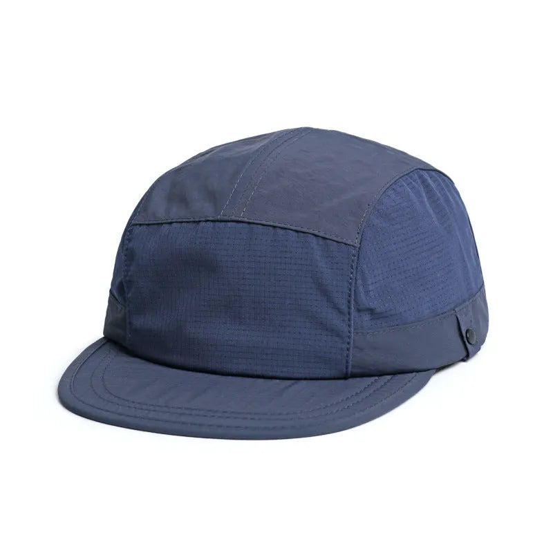 Dome style soft tongue sun hat in breathable polyester fabric on a neutral background.