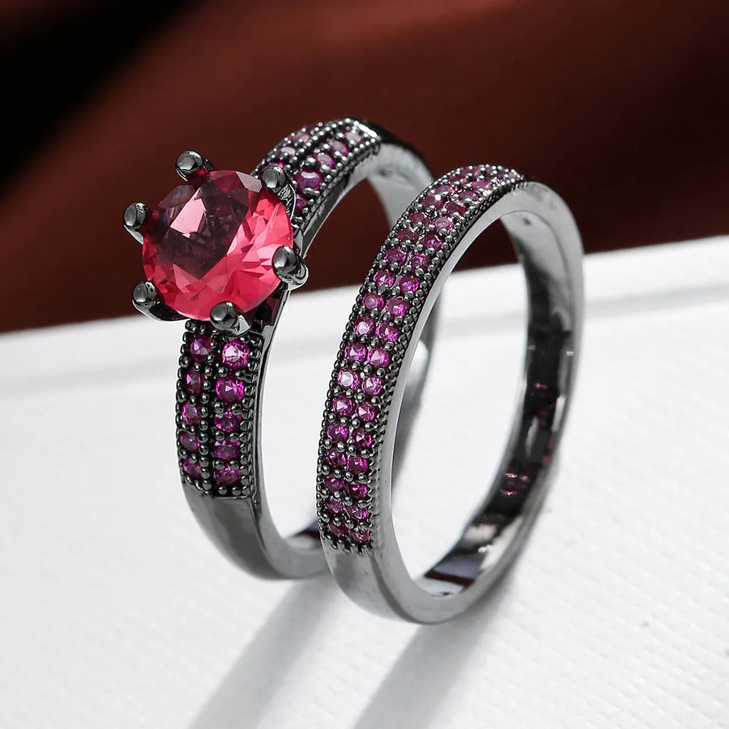 Two copper zircon hollow geometric rings with electroplated colour finish on white background
