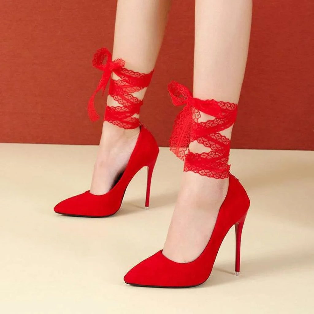 Black pointed toe women's high heel with an ankle buckle strap and a 12cm heel.