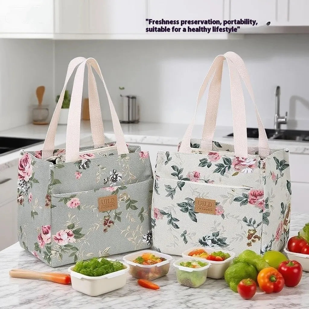 Women's printed canvas handbag with aluminium hardware in a selection of floral and animal designs.