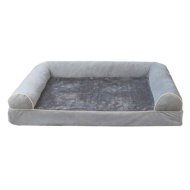 Breathable square sponge dog bed for pets in blue colour, shown in a home setting.