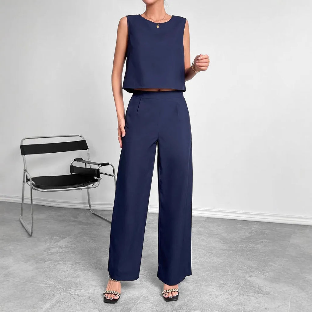 Red polyester wide leg pants and sleeveless top two-piece set with round neckline