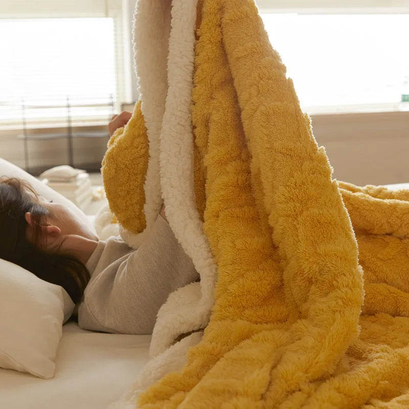180x200cm thermal polyester blanket in tea green colour on a bed