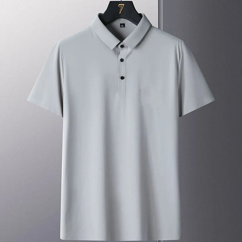 Man wearing a solid colour non-ironing short sleeve business casual shirt in a nylon blend fabric.
