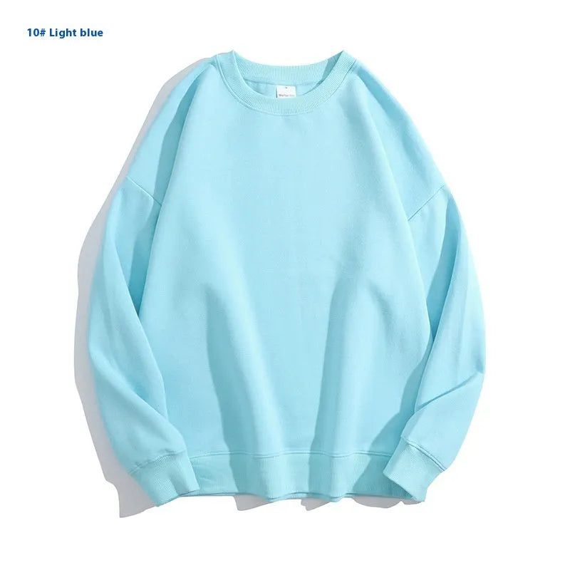 Women's loose round neck off shoulder cotton sweater in a mint green colour, long sleeves.