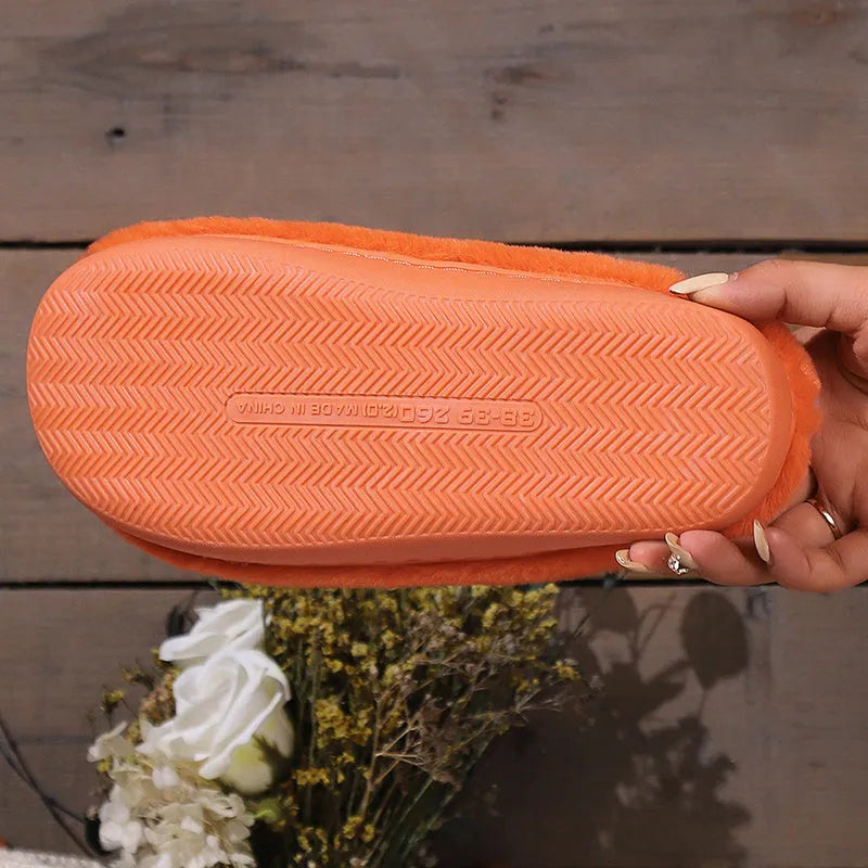 Orange Halloween pumpkin design plush slippers with coral velvet upper and flat PVC soles