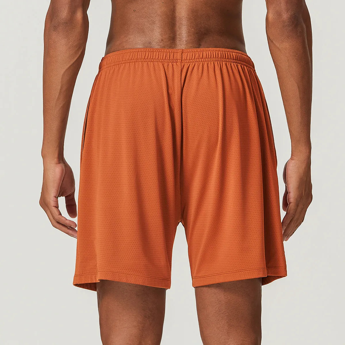 Men's quick-drying breathable running shorts in sky blue colour, showing double-layer construction and mid-waist fit.