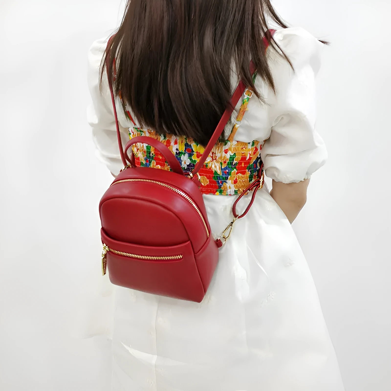 Soft PU mini backpack in street style with three-dimensional pocket and internal phone compartment