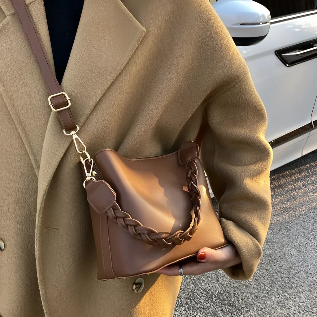 Retro brown PU leather crossbody bucket bag with a woven texture design.