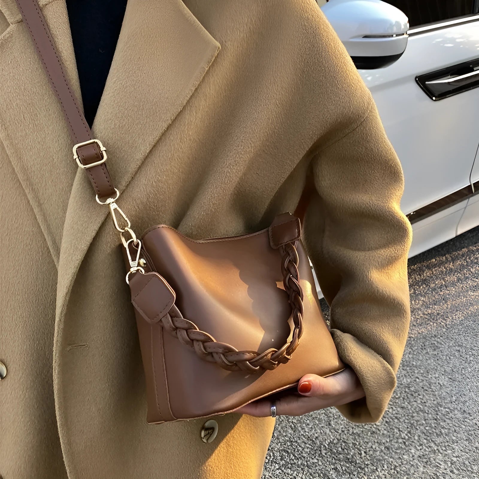 Retro brown PU leather crossbody bucket bag with a woven texture design.