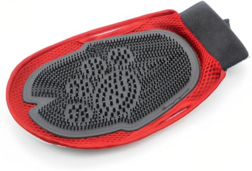 Red pet bathing glove with integrated brush for grooming and hair removal during pet baths.