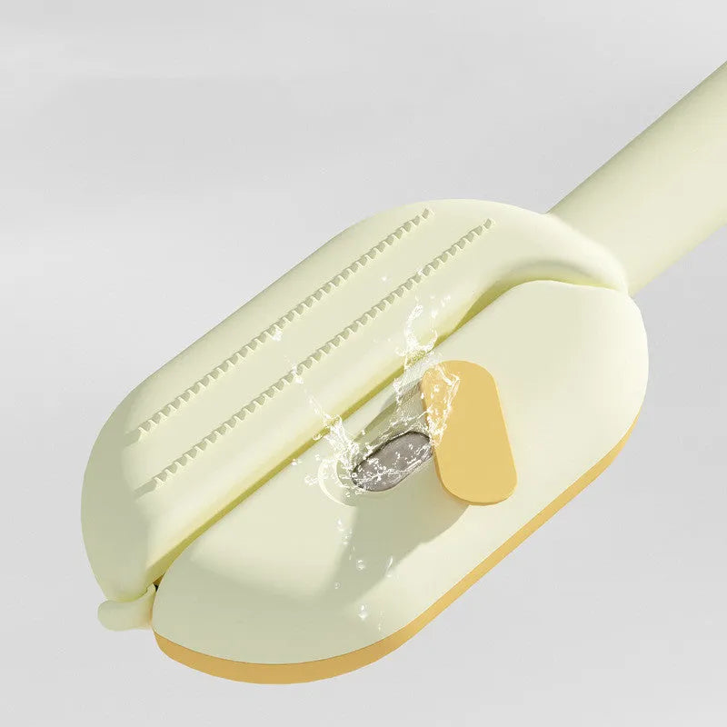 Blue pet grooming comb with integrated water tank and cleaning brush on a white background.