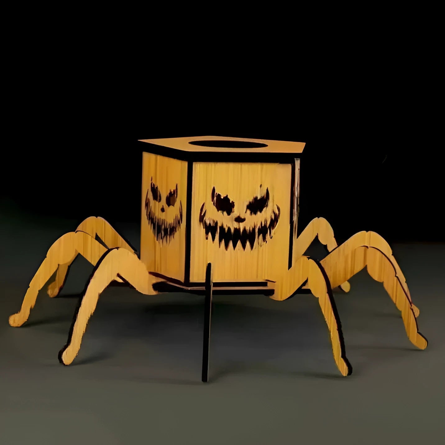 Wooden Halloween ornament with ghost and spider design on a lantern candlestick, 21cm tall.