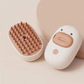 White or yellow rechargeable pet steam brush with rubber comb teeth and water tank.