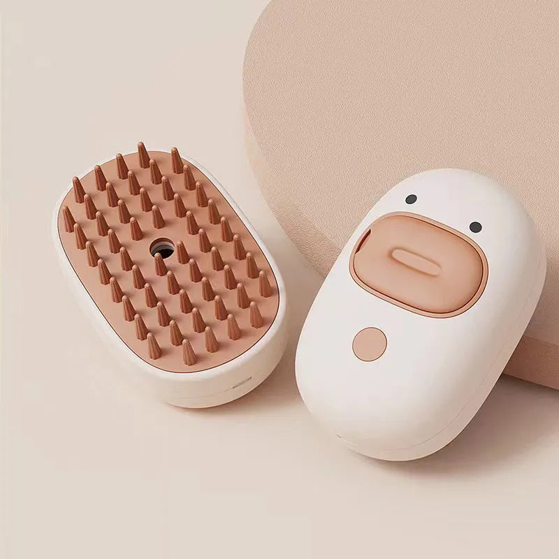 White or yellow rechargeable pet steam brush with rubber comb teeth and water tank.