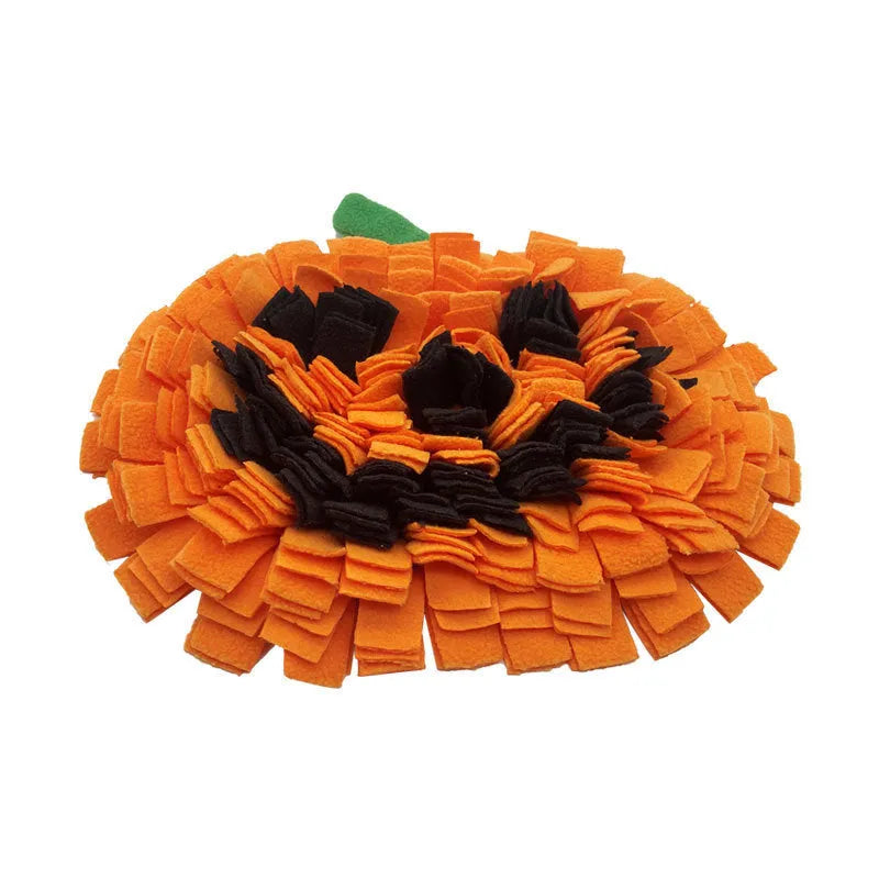 Orange pumpkin-shaped dog smell mat with fabric strips for slow feeding