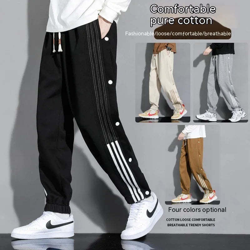 Men's loose cotton blend sweatpants with ankle-tied cuffs in black colour