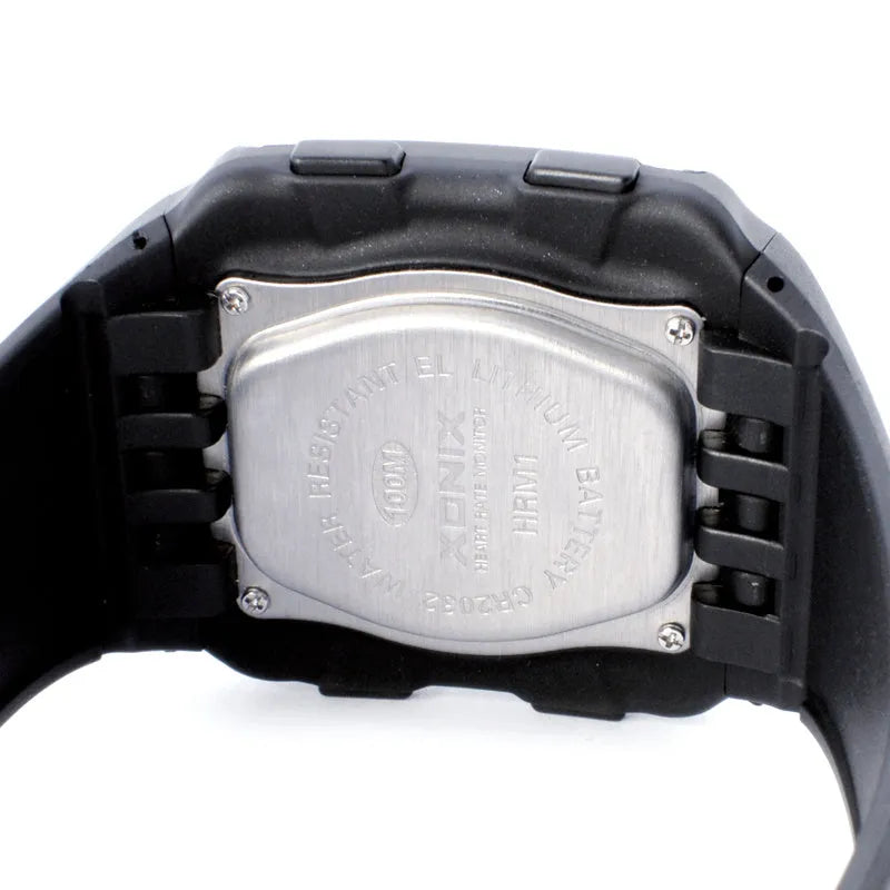 Men's waterproof digital sports watch with square dial, luminous display, heart rate monitor, black resin strap, and rubber case on wrist