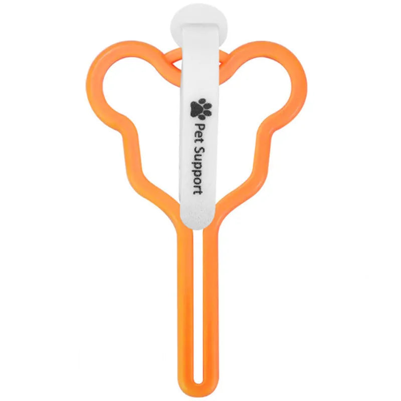 Hands-free dog poop bag holder with adjustable Velcro strap attached to a dog lead