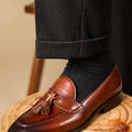 Men's black genuine leather tassel loafers with rubber sole for business casual wear