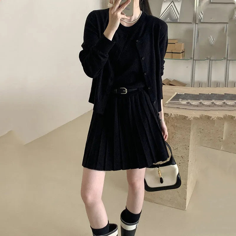Women's grey knitted vest skirt and cardigan two-piece set with pleated design and belt