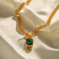 Gold electroplated titanium steel necklace with French retro geometric pendant and emerald zircon details