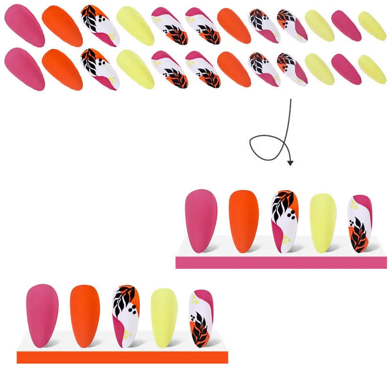 Four boxes of Wear Armour medium almond frosted nail stickers showing French leaf, plating, macaron, and leopard print designs.