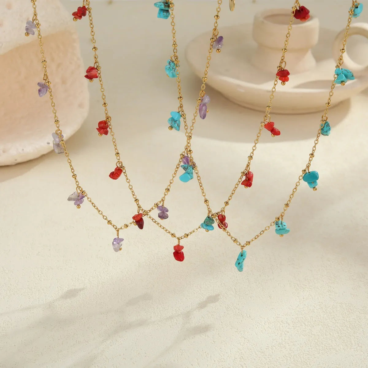 Natural stone necklace with stainless steel chain and 18K gold plating, available in amethyst