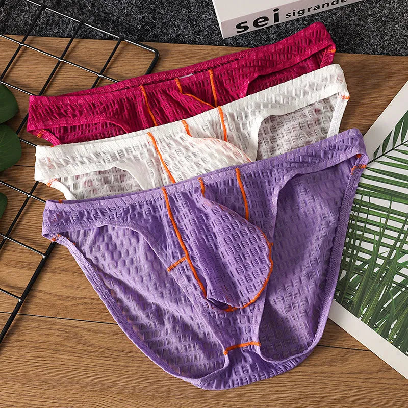 Men's low waist lace briefs in ice silk fabric on a colour swatch showing white, black, green, red, and purple.