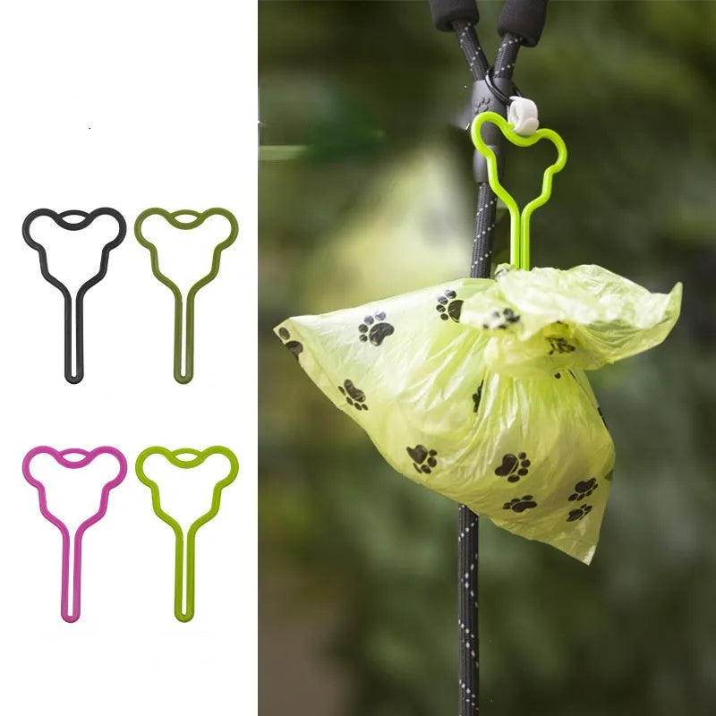 Hands-free dog poop bag holder with adjustable Velcro strap attached to a dog lead