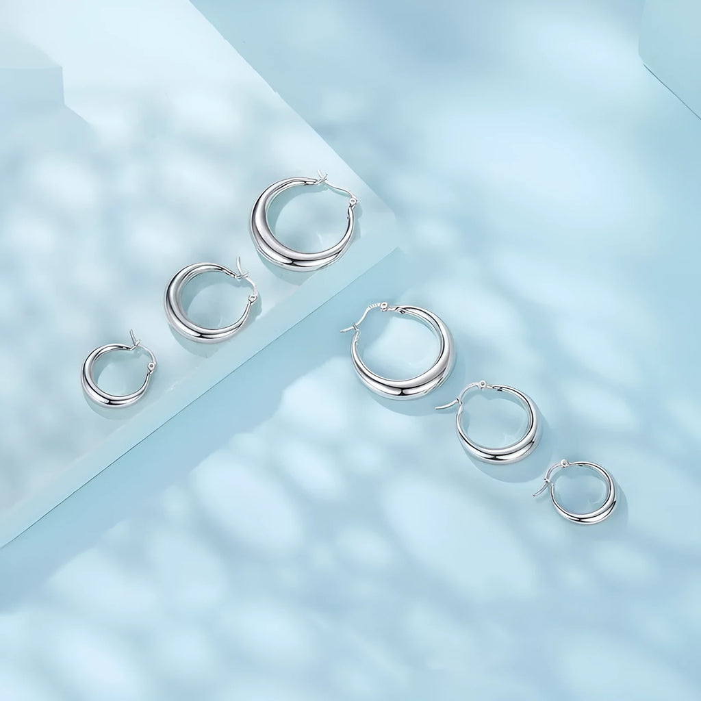 Geometric ring ear clip earrings in copper with silver electroplated needle