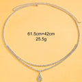 Gold women's waist chain with water drop rhinestone pendant and lobster buckle closure