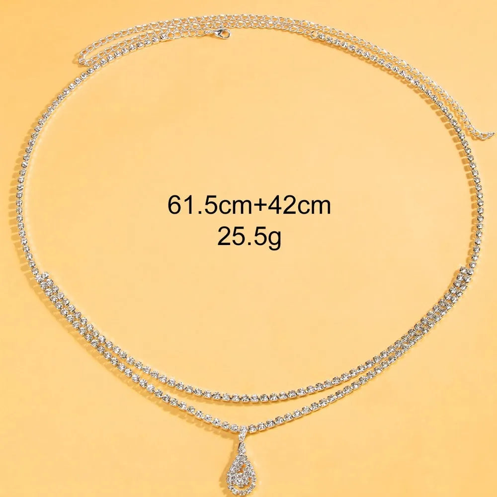 Gold women's waist chain with water drop rhinestone pendant and lobster buckle closure