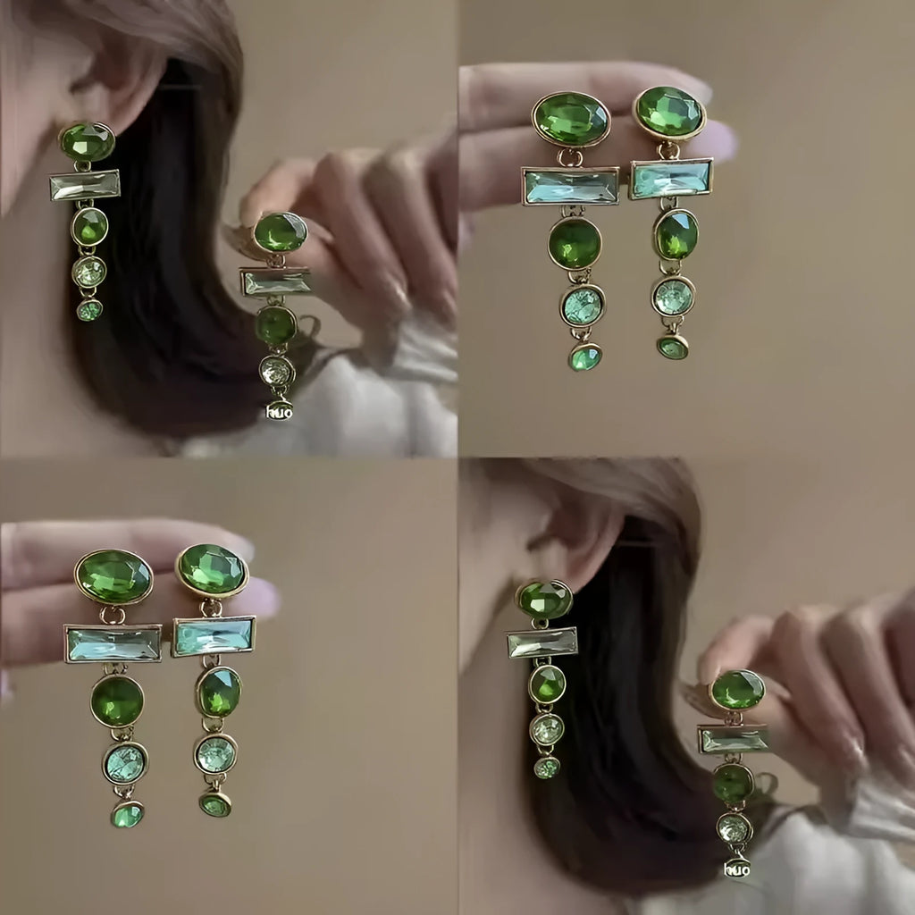 A pair of retro green gradient tassel earrings with inlaid zircon stones in a Chinese geometric style.