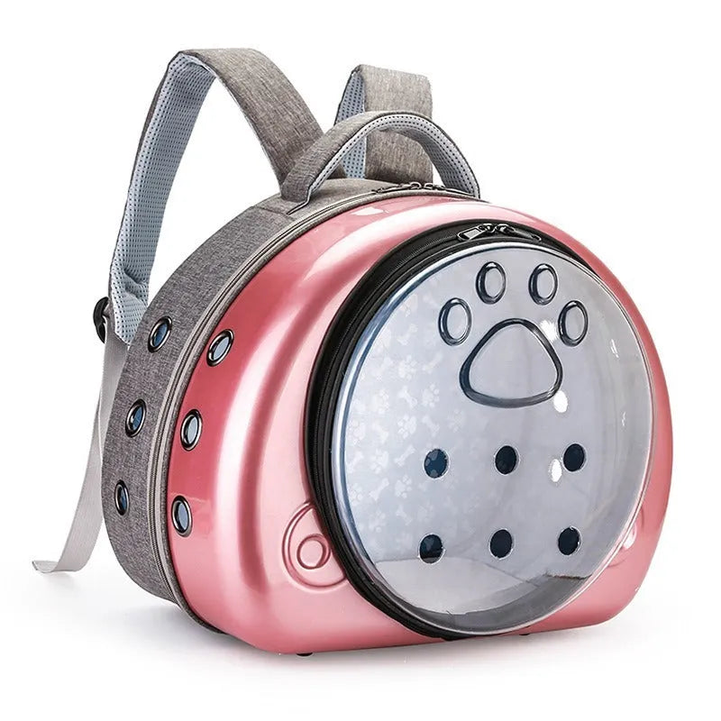Transparent space capsule-shaped cat carrier bag with a handle in a choice of coloured front covers.