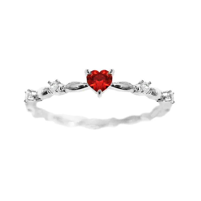 Copper zircon peach heart ring in gold on hand, unisex size
