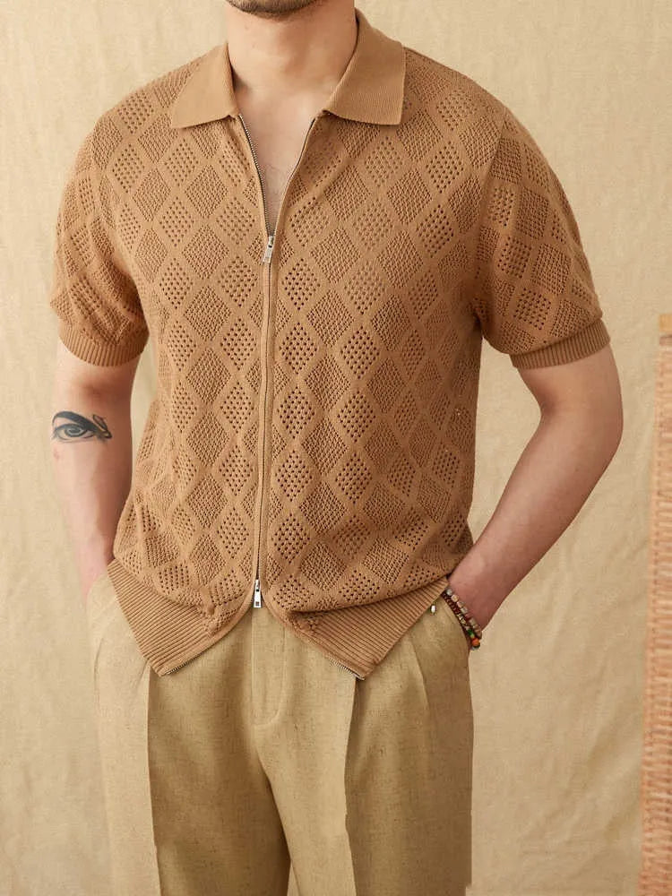 Light brown cotton cardigan with front zip and lapel collar on a hanger