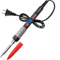 Grey 90W electric soldering iron with ceramic heating core, five tips, sponge, and solder on a workbench.