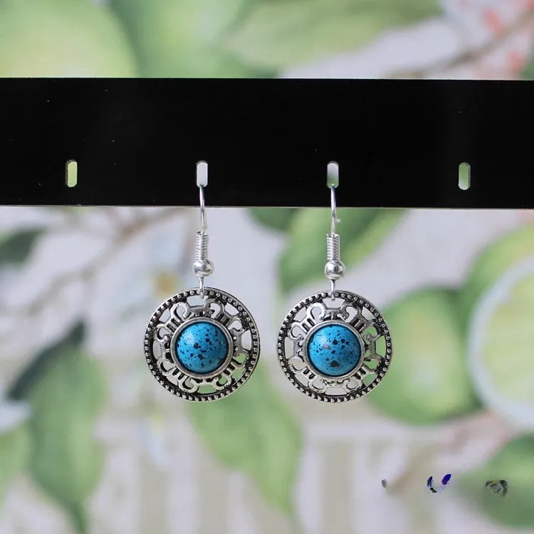 Miao silver geometric flower disk earrings with turquoise and auspicious cloud patterns
