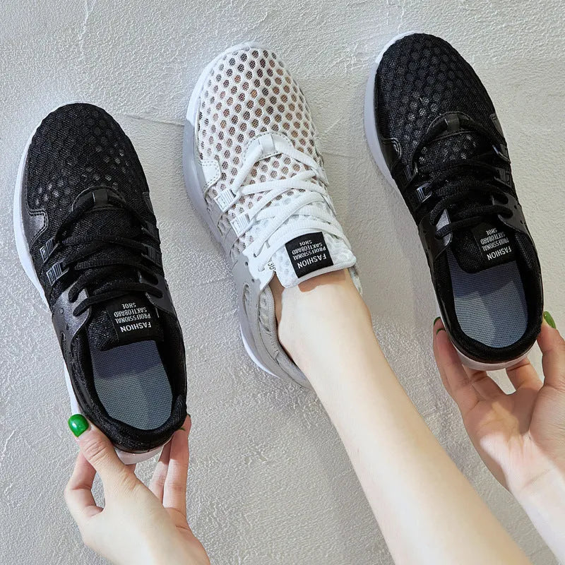 Low-top casual sneaker with hollow breathable mesh upper and round toe in a white net colour variant.