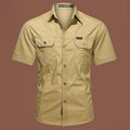 Men's short sleeve cotton work shirt in a loose fit, shown in a choice of colours including army green and blue.