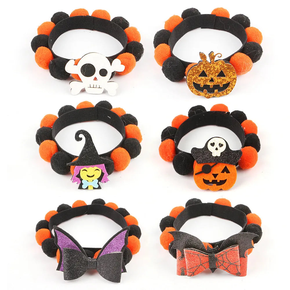 Halloween pet fur ball collar in pumpkin orange colour with fluffy ball on a black collar