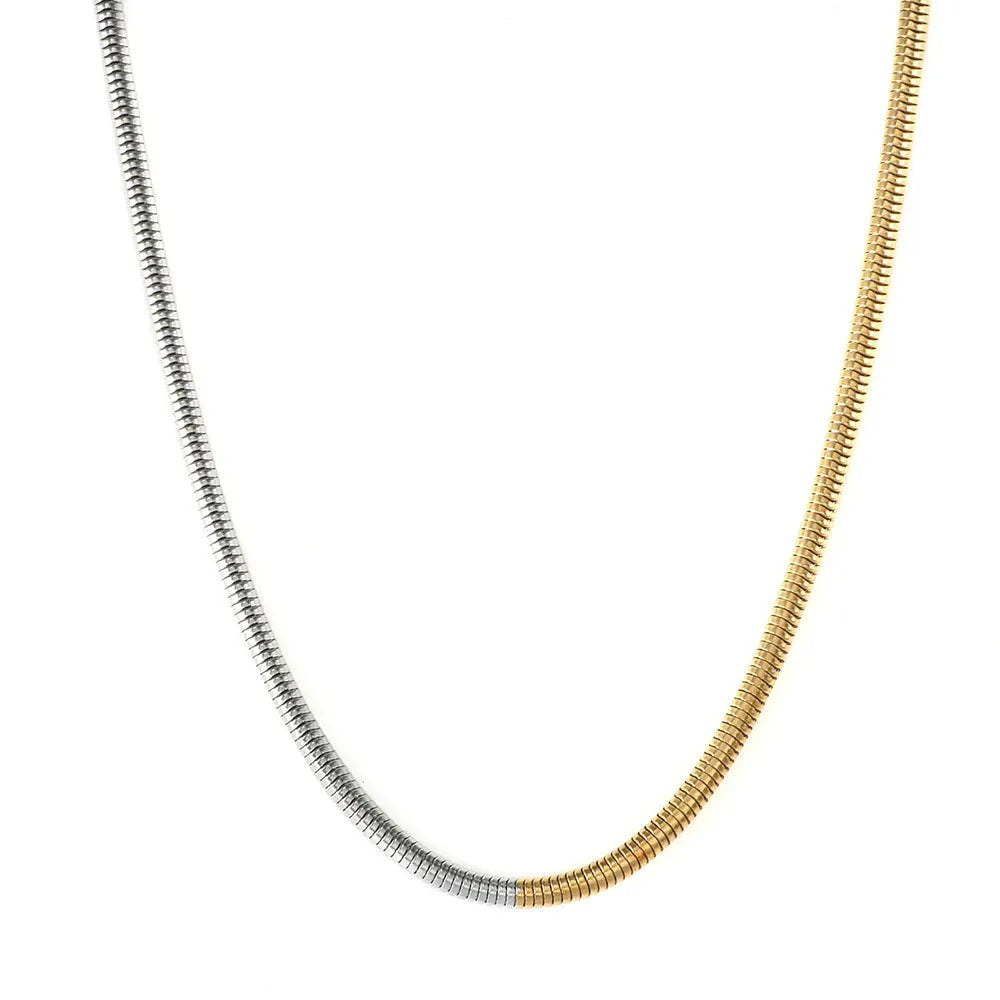 Gold-coloured stainless steel snake bone chain necklace with a 3mm width and geometric design.
