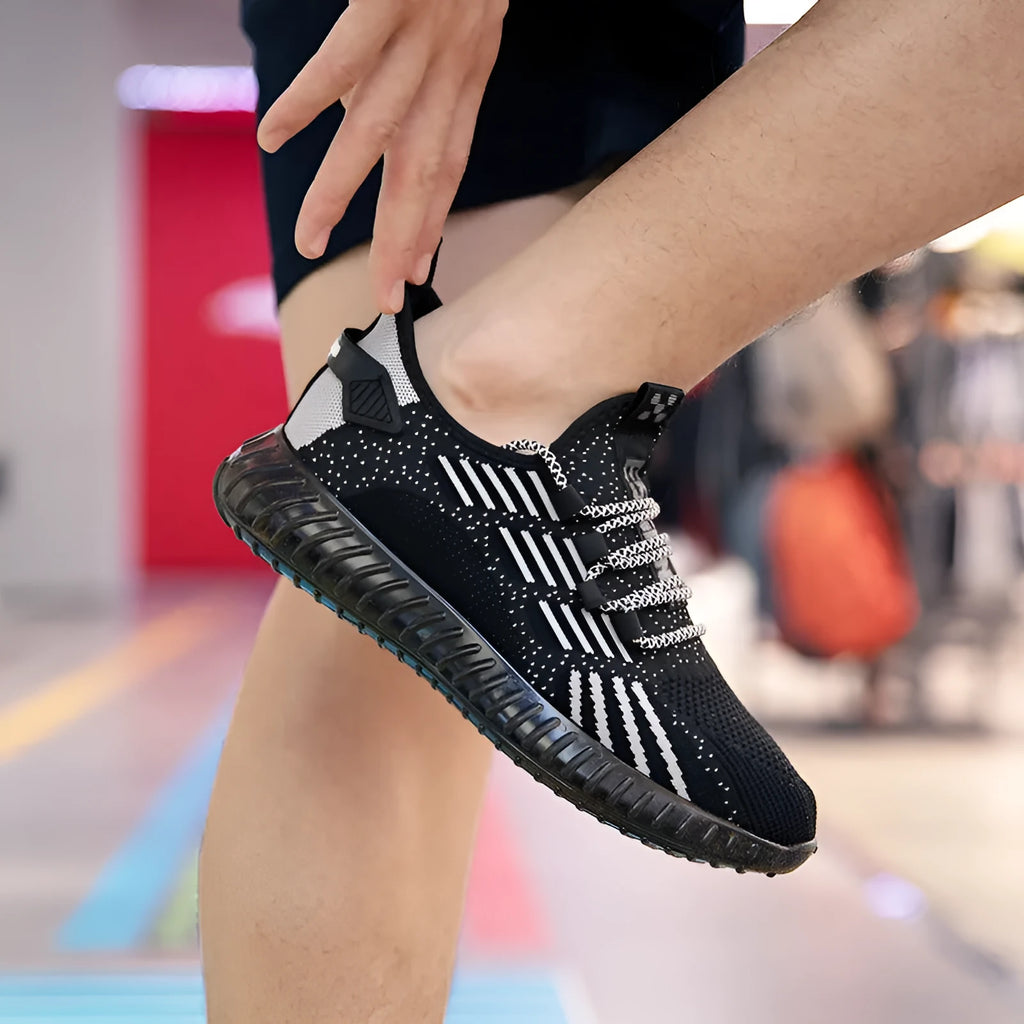 Men's white breathable sports shoes with mesh lining and platform heel on grey background