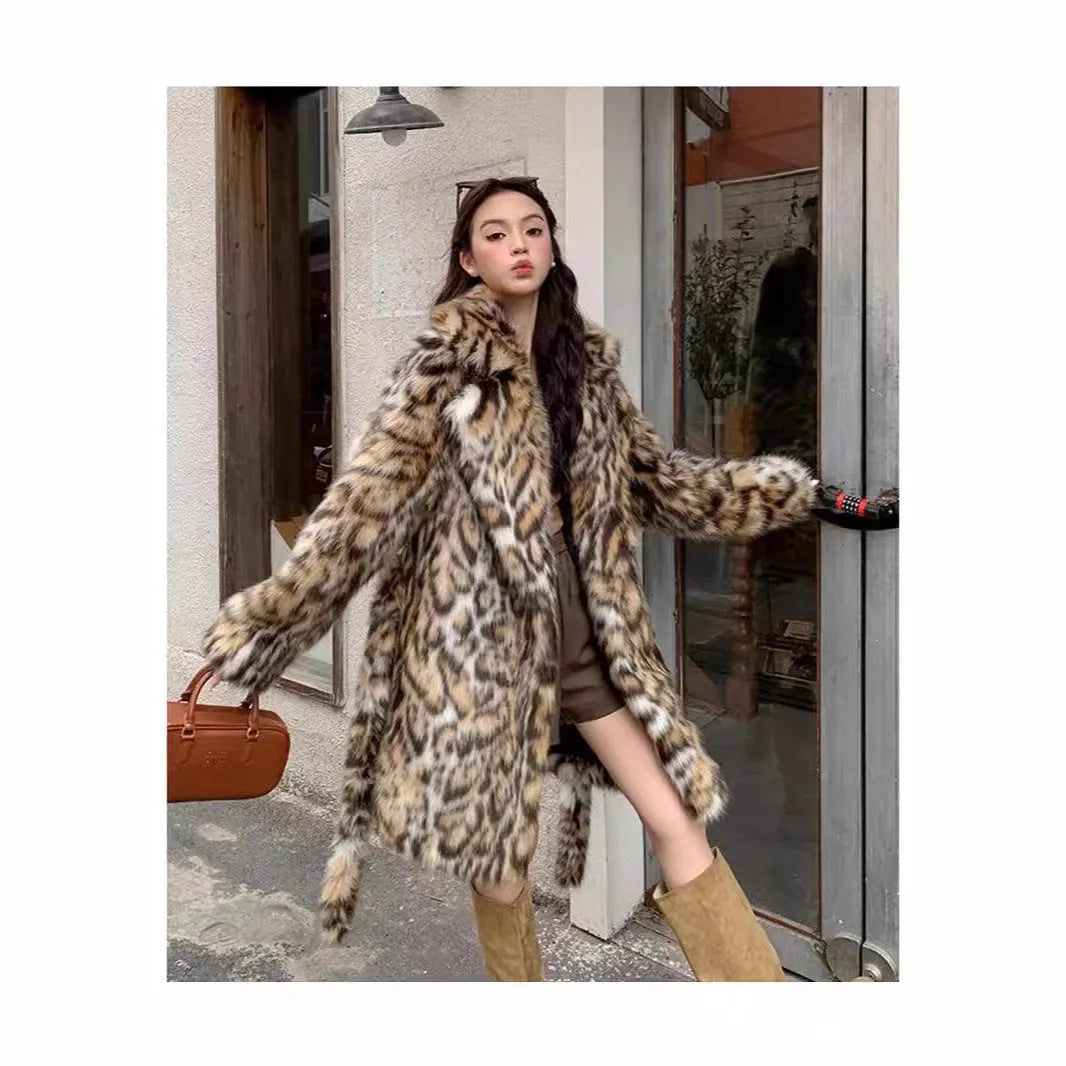 Women's faux fur coat with fox fur collar in street fashion style showing pockets and regular sleeves