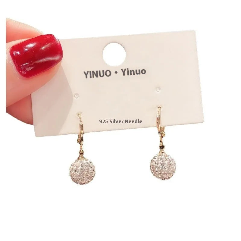 Geometric copper zircon earrings with rose design elements in multiple colour variations