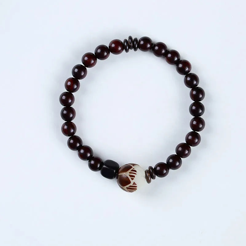 Natural rosewood knitted unisex bracelet with 10mm flower-shaped beads double circle on white background